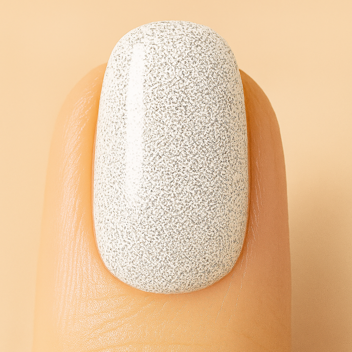 Glittery gel nail polish on a nail