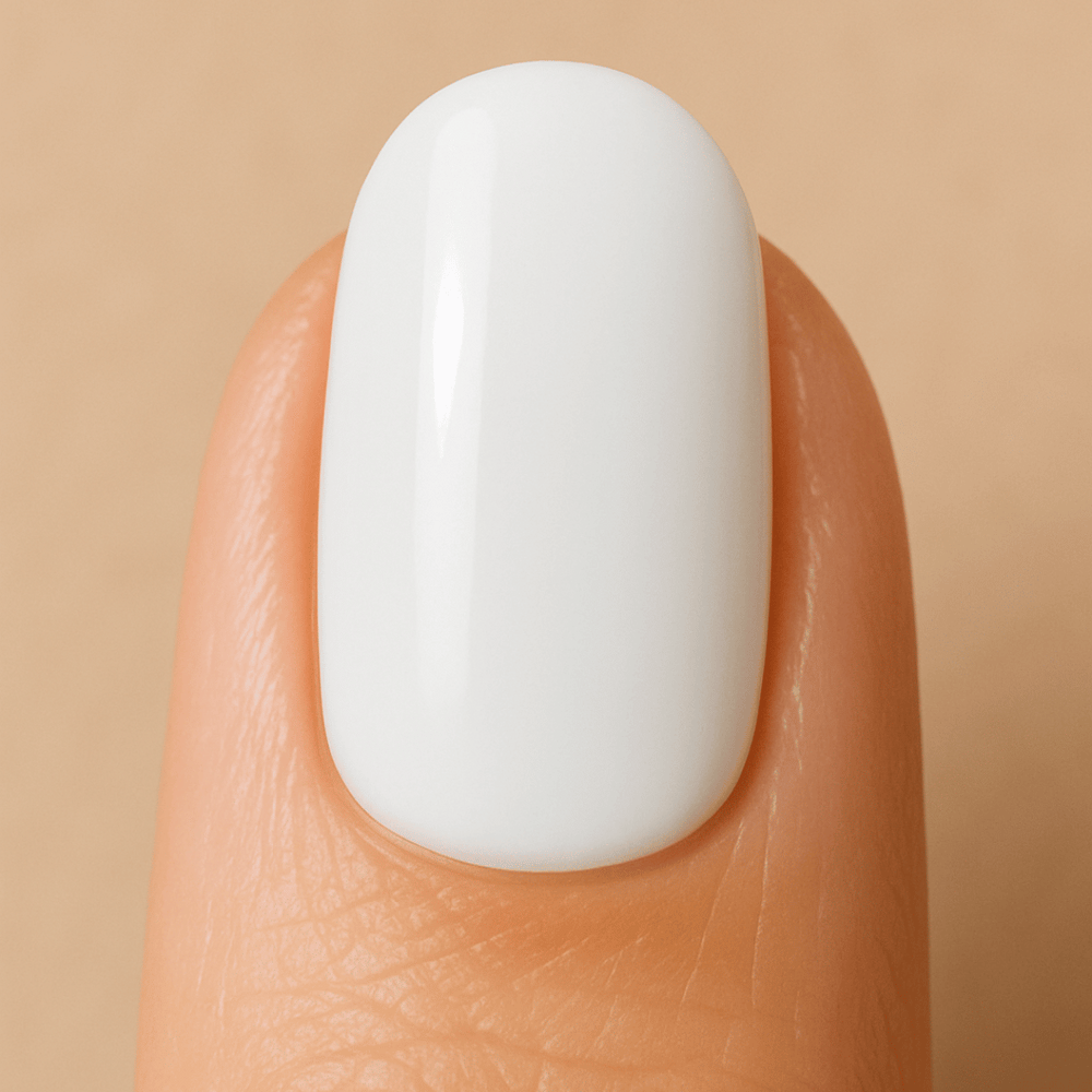 White BIAB applied to a nail