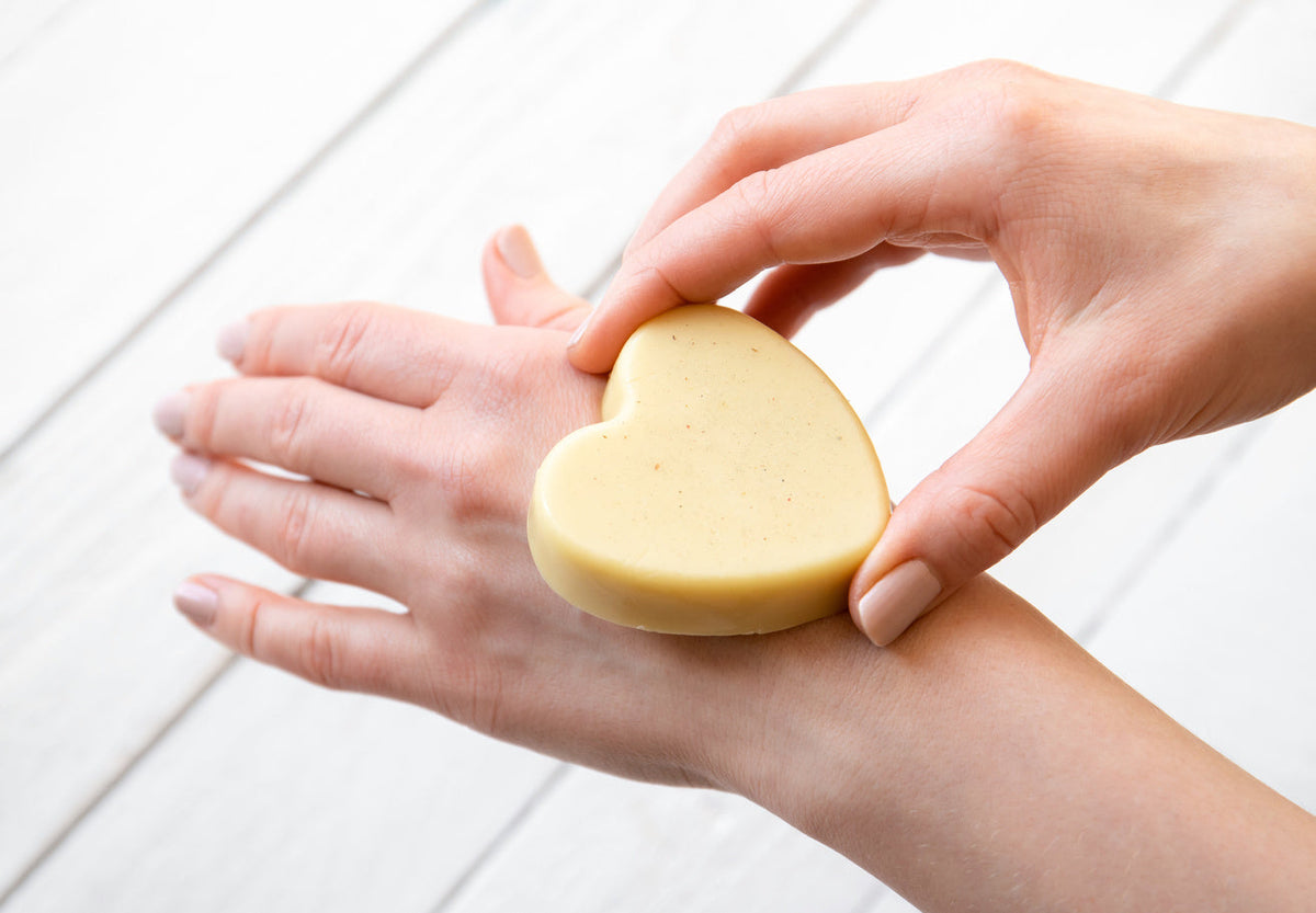 hands holding she butter bar